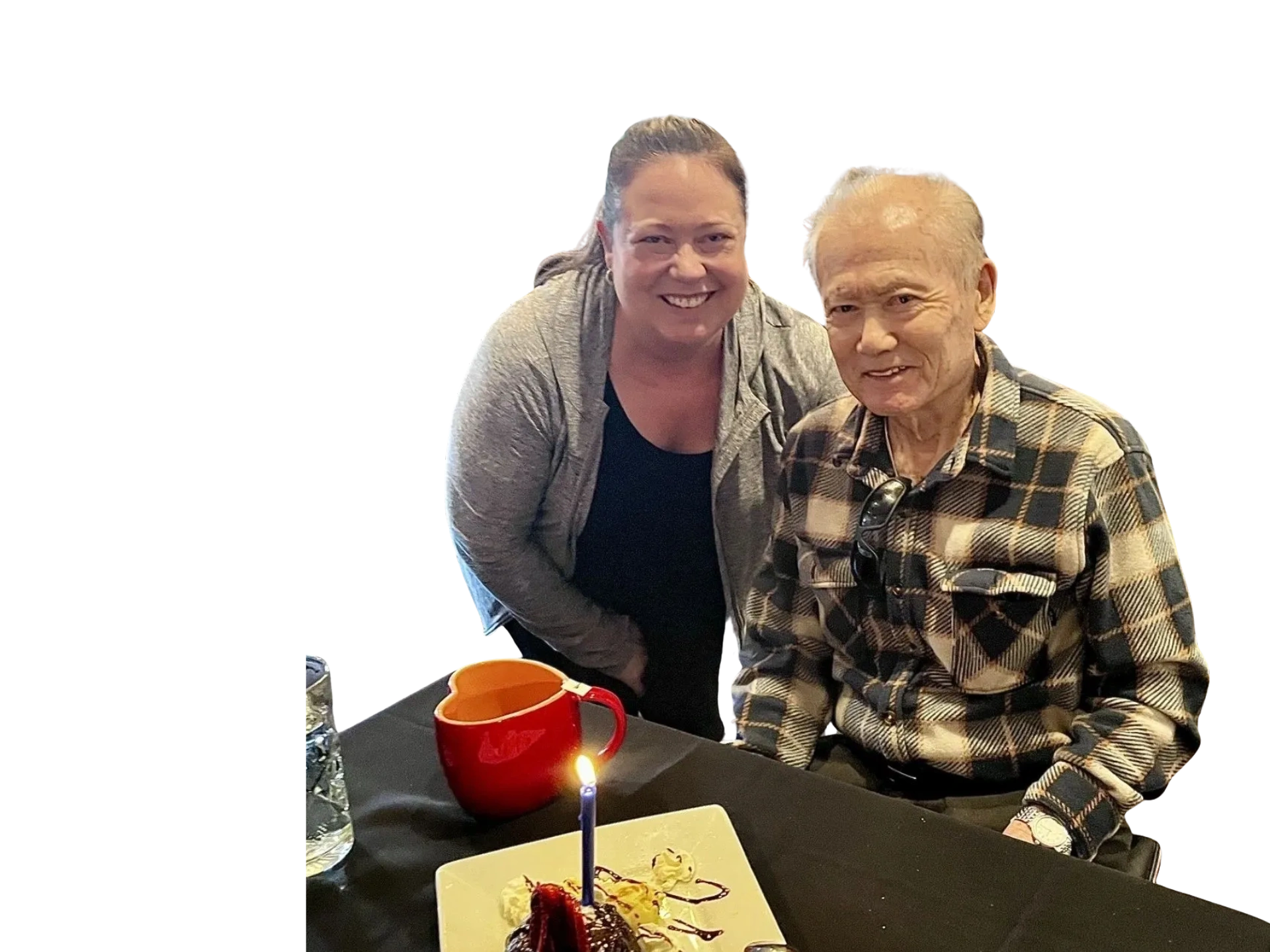 Kimberly Bellinger with a client celebrating his birthday